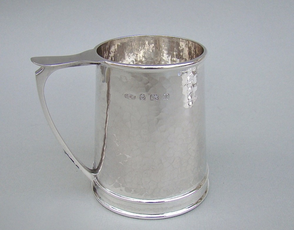 arts craft silver christening mug by a e jones birmingham 1920