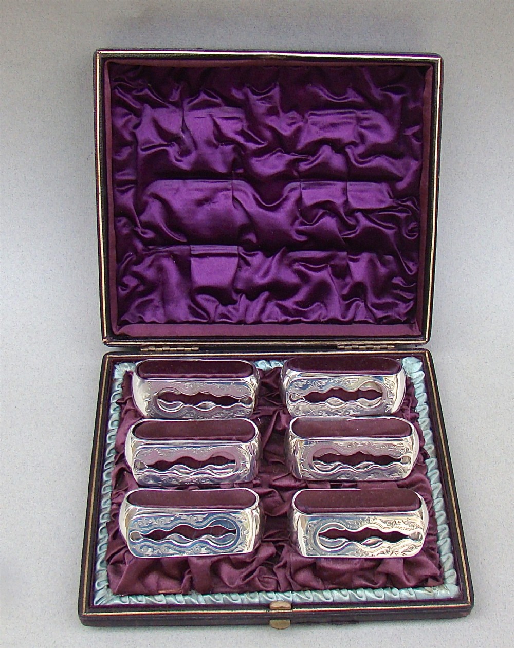 CASED SET OF SIX VICTORIAN SILVER PLATED NUMBERED NAPKIN RINGS CIRCA 1870 cased set of six victorian silver plated numbered napkin rings circa 1870