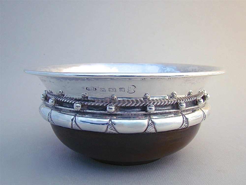 arts craft silver mazer bowl by a e jones birmingham 1935