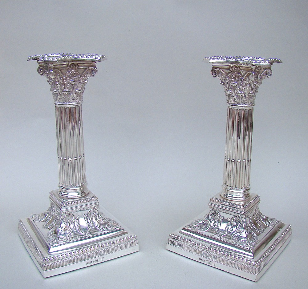 fabulous pair of edwardian sterling silver corinthian column candlesticks by james dixon sons sheffield 1901