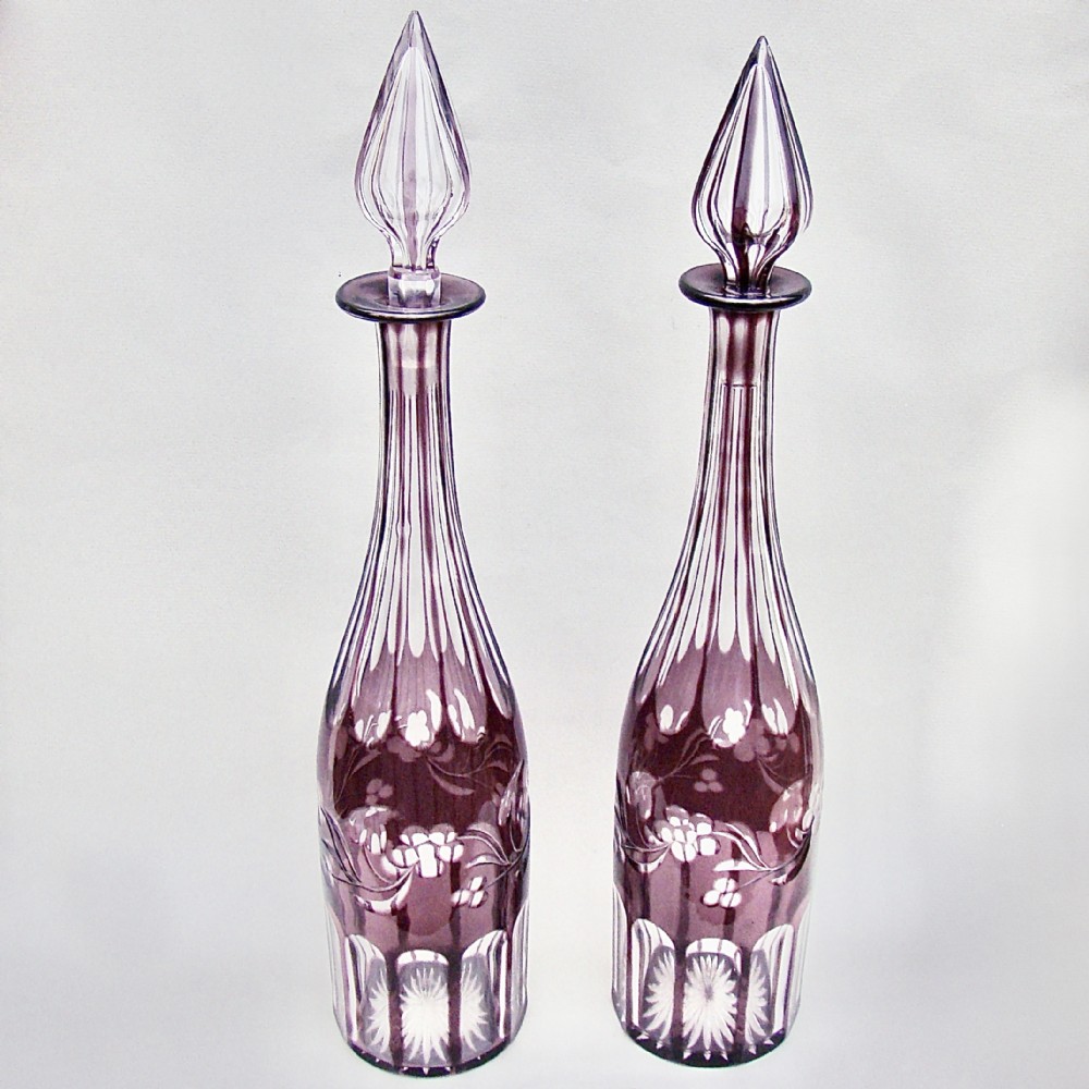 elegant pair of bohemian amethyst glass decanters circa 1890