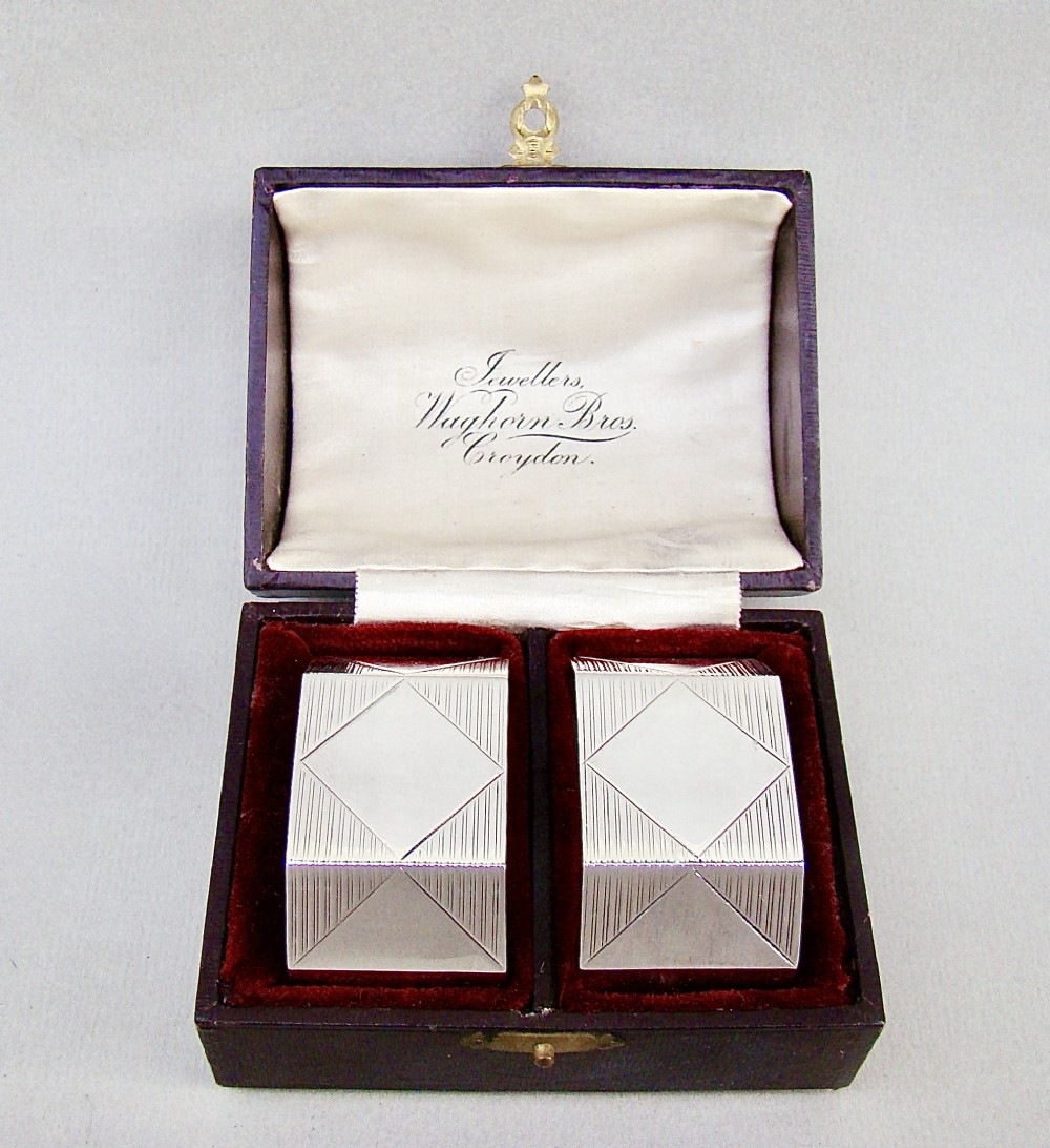 superb cased pair of art deco solid silver napkin rings by selfridge co birmingham 1938