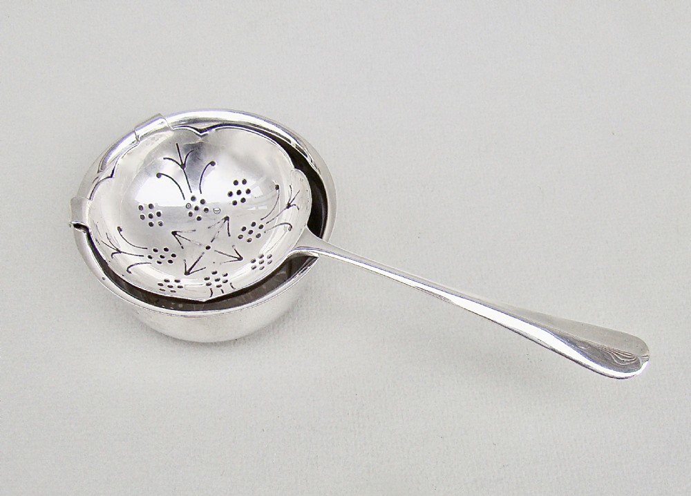 midcentury solid silver tea strainer by the cooper brothers sons ltd sheffield 1954