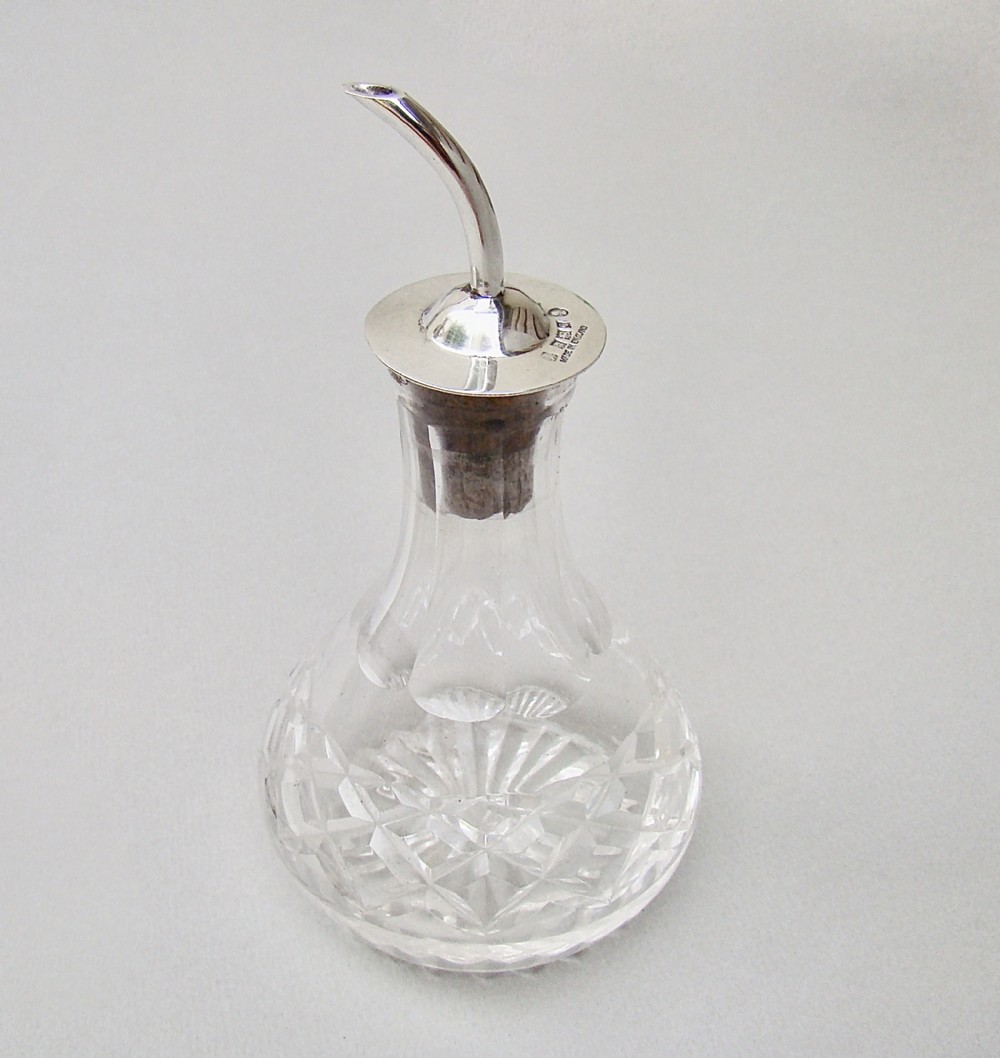 midcentury silver mounted angostura bitters bottle by the adie brothers birmingham 1952