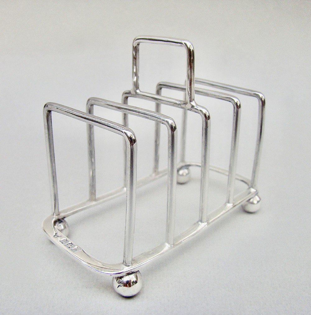 elegant edwardian silver toast rack by the ce nixon sheffield 1907