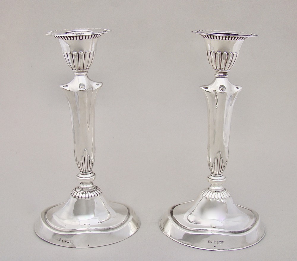 pair of edwardian sterling silver candlesticks by robert pringle sons london 1903
