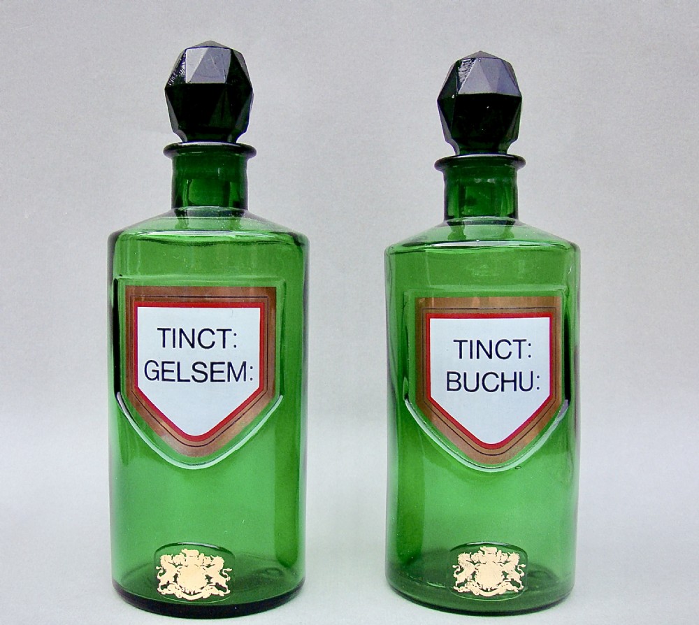 rare pair of victorian royal warrant green apothecary bottles circa 1890