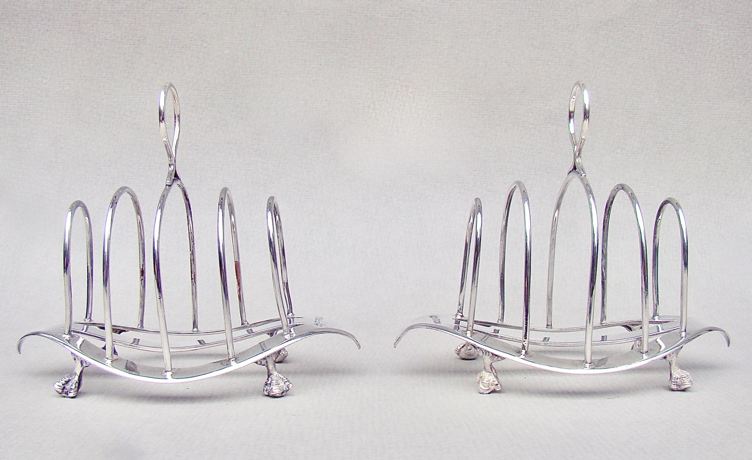 good pair of victorian solid silver toast racks by william hutton sons sheffield 1899