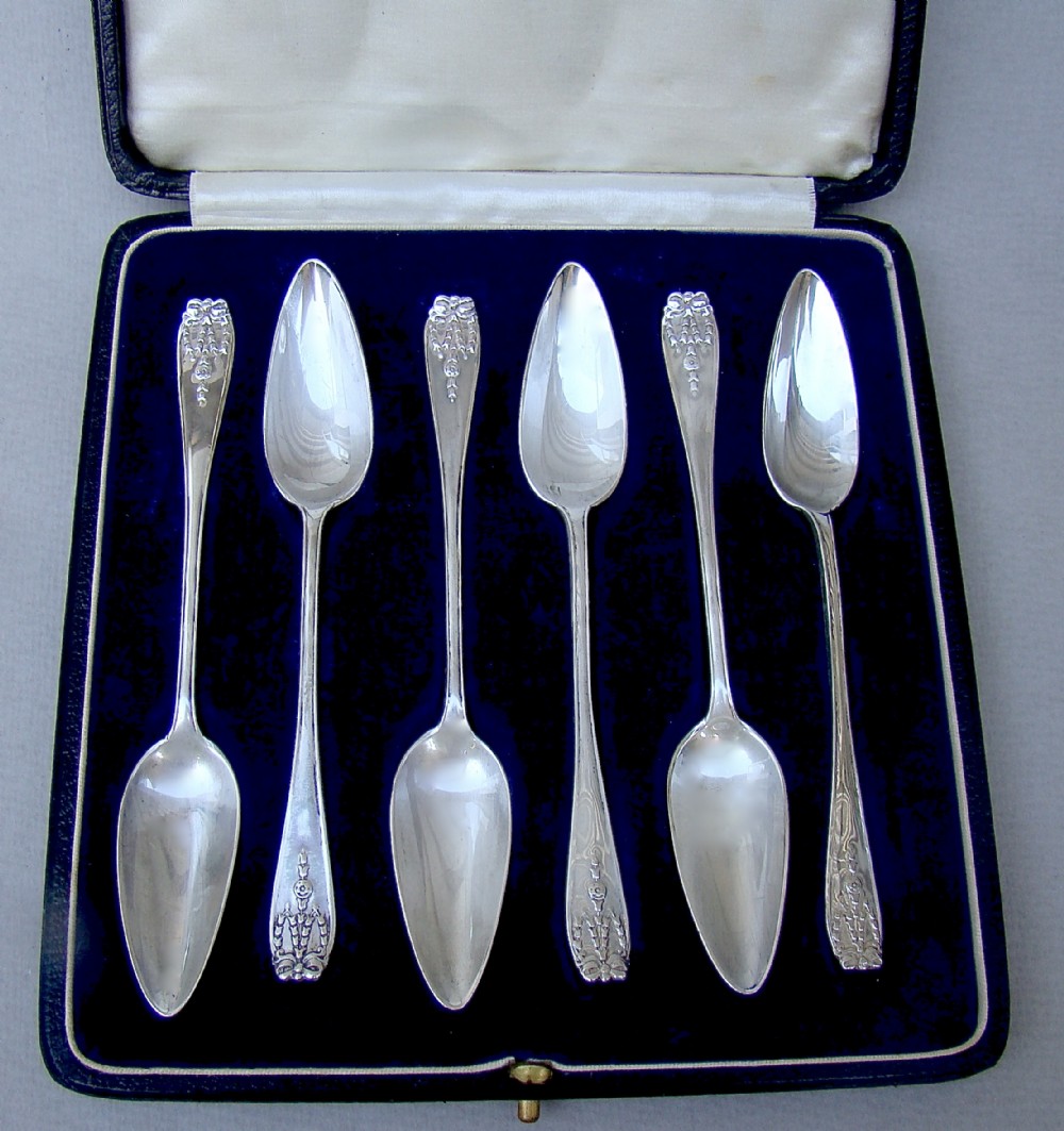 elegant cased set of six solid silver grapefruit spoons by josiah williams co london 1925