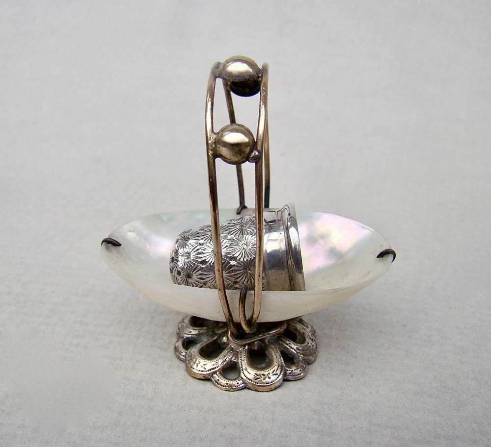 delightful charles horner silver thimble in mother of eparl ormulu basket circa 1890