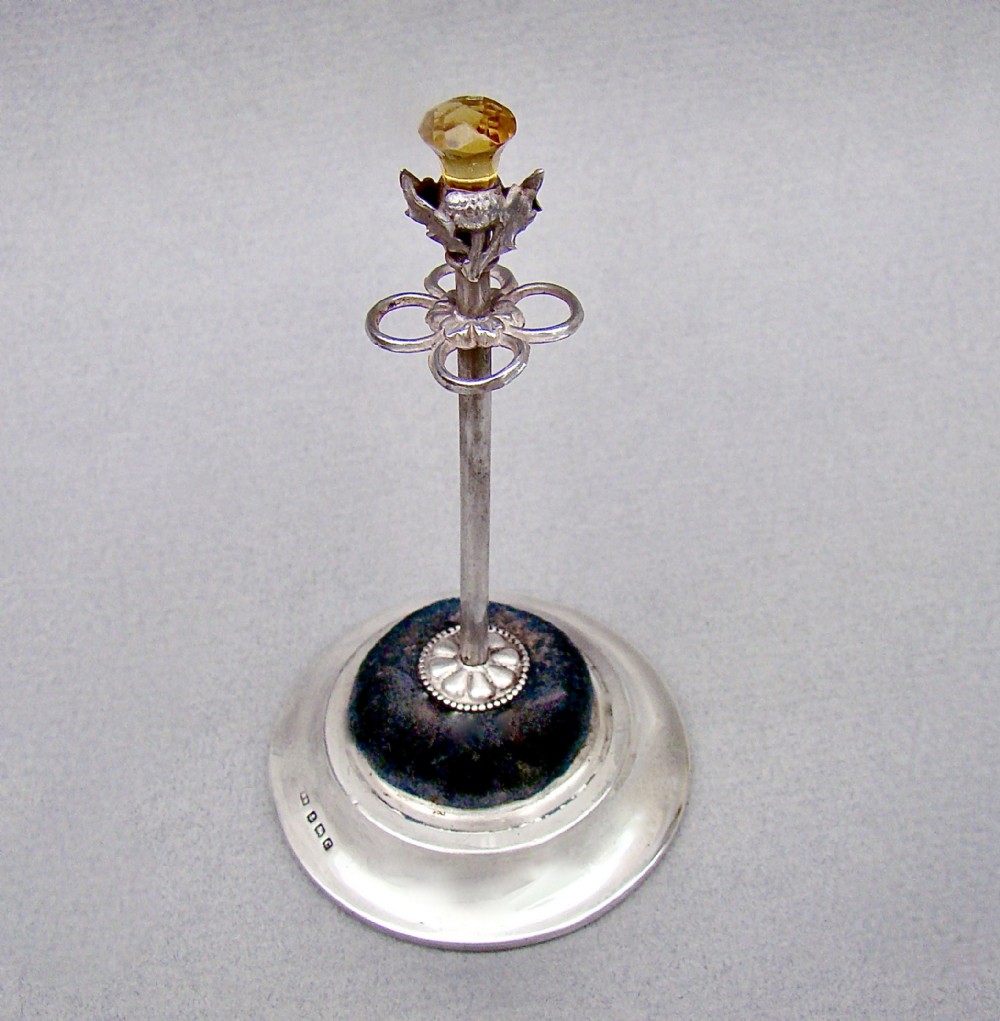 delightful george v silver thistle hat pin holder by crisford norris birmingham 1927