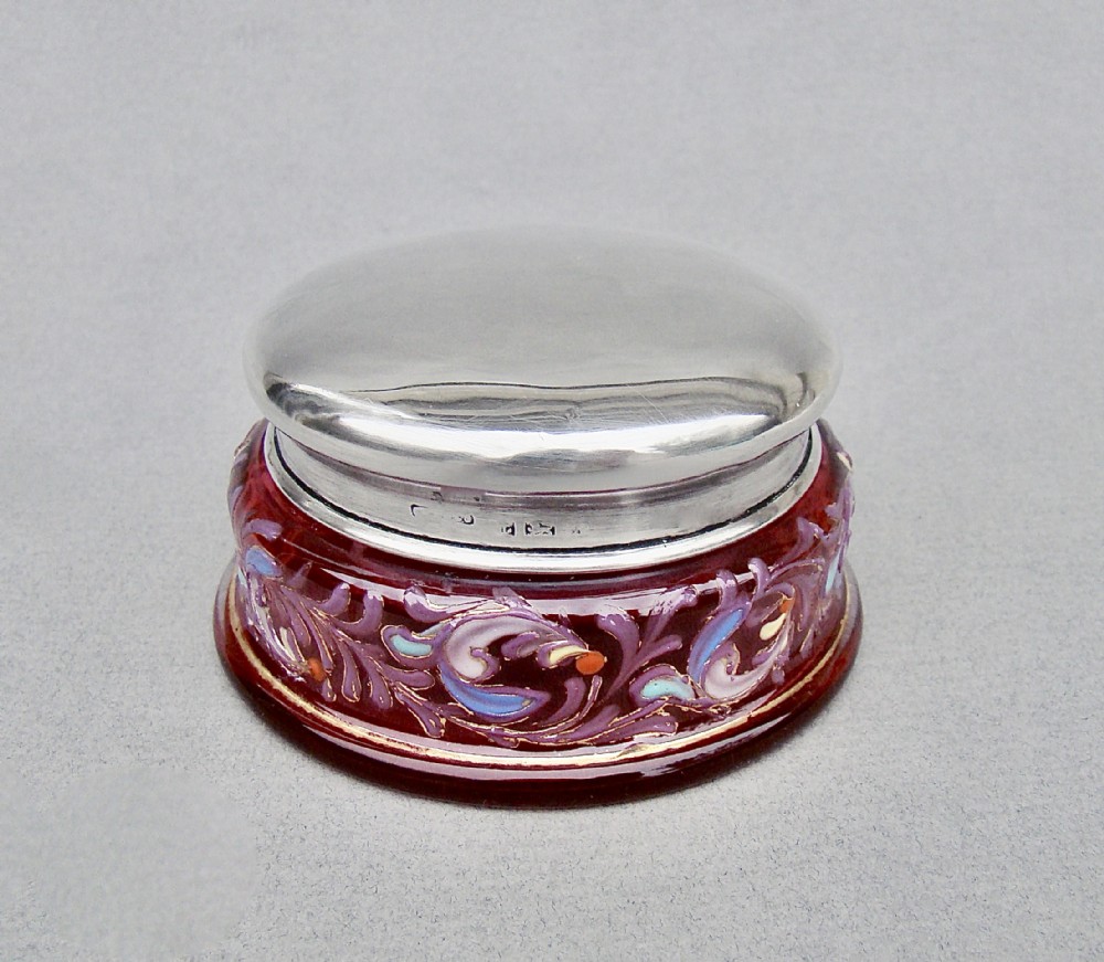 delightful silver lidded enamelled cranberry glass trinket box birmingham 1922