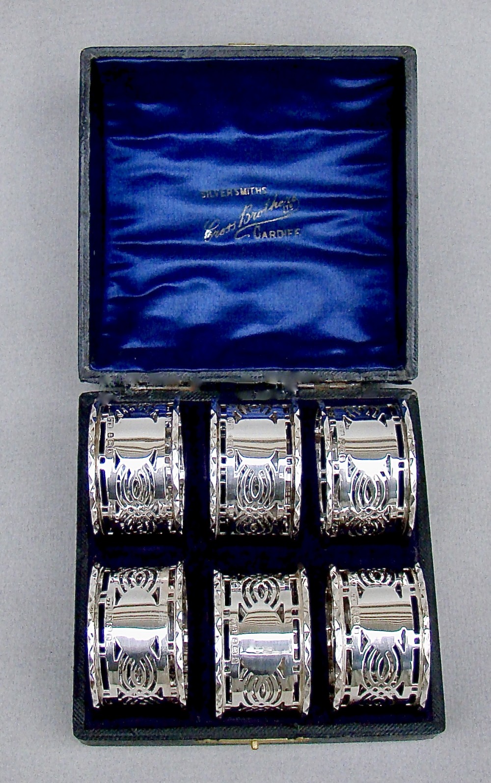 cased set of six solid silver napkin rings by ct burrows sons birmingham 1916
