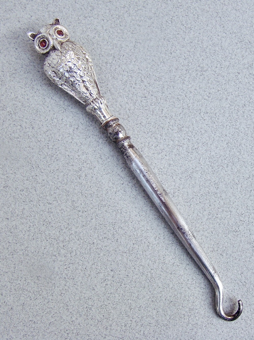exquisite edwardian silver owl button hook by crisford norris birmingham 1910