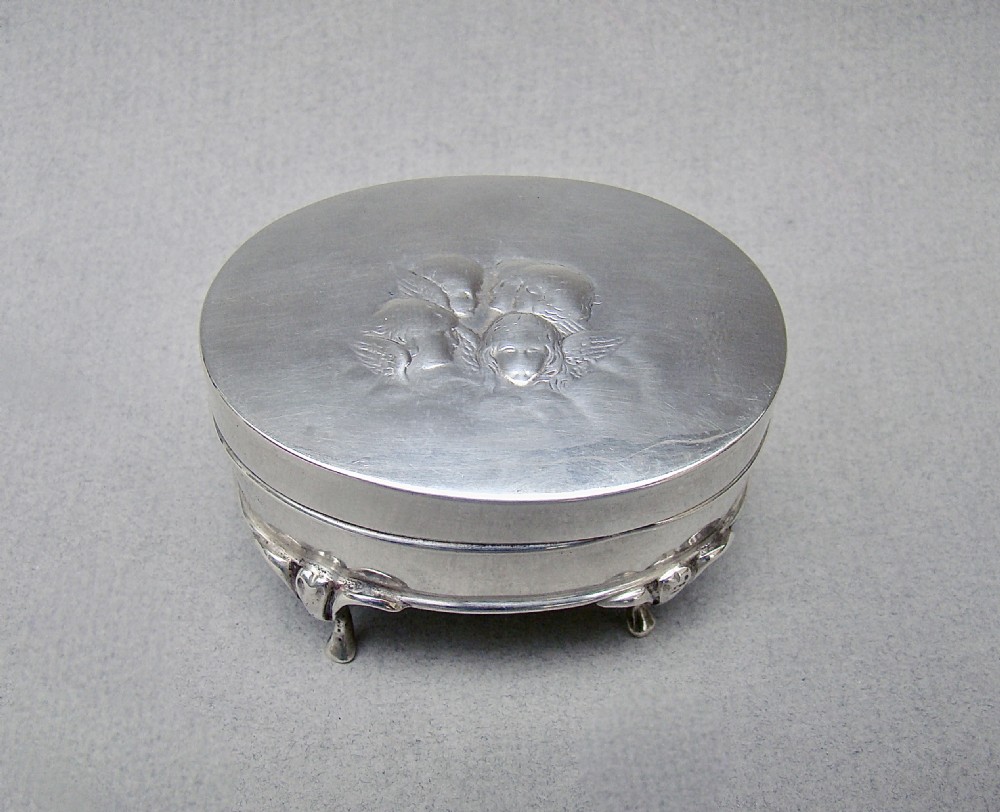 edwardian silver reynolds' angels jewellery box by william comyns london 1909