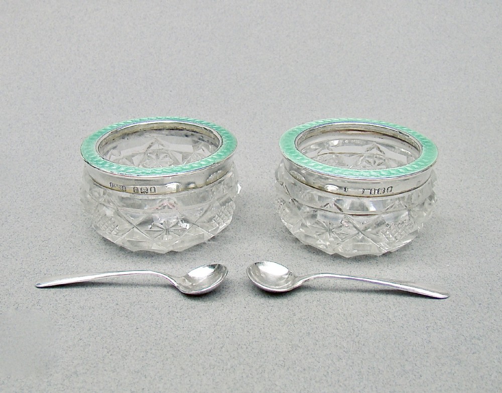 rare pair of art deco silver and guilloche enamel cut glass salts by henry williamson london 1924